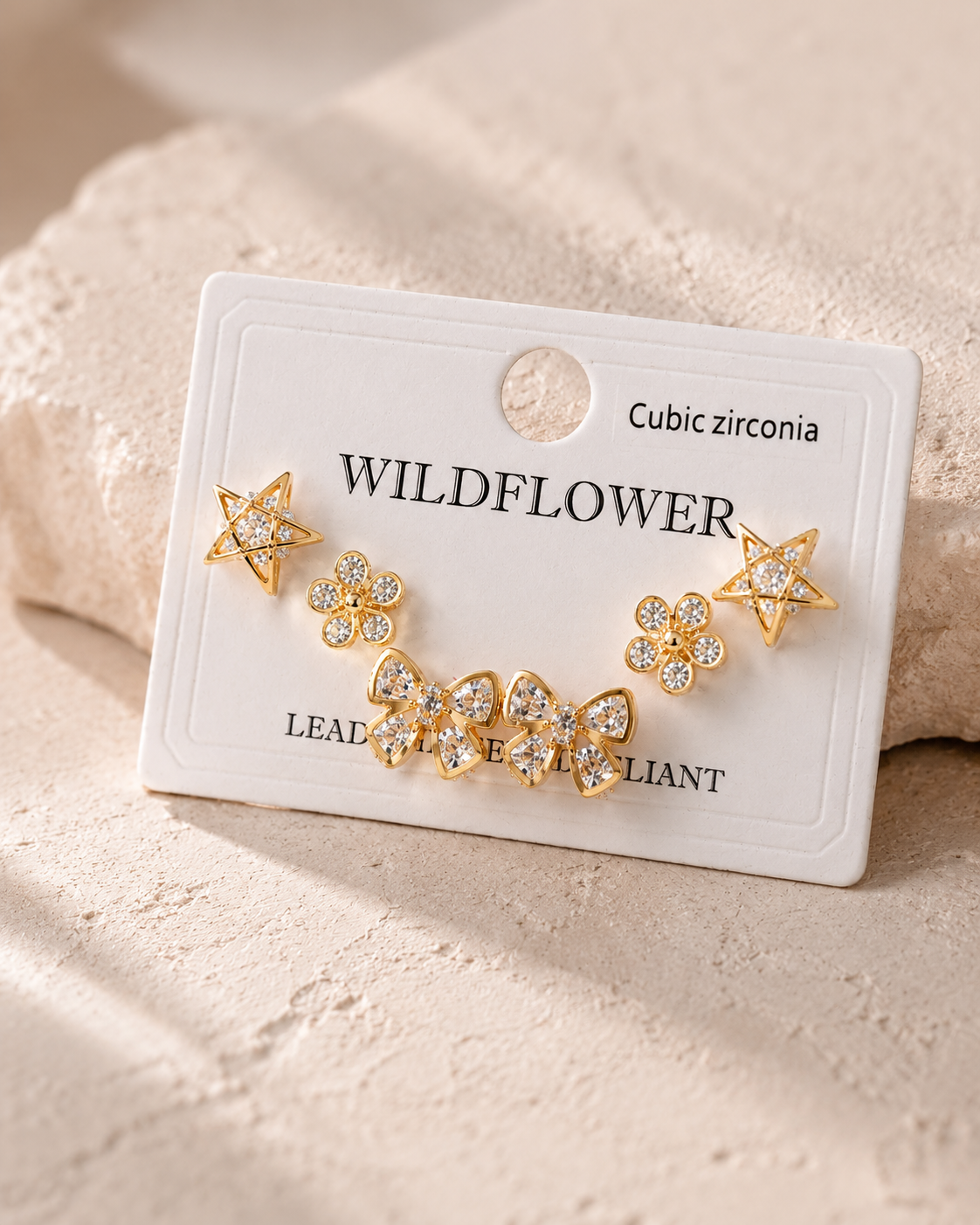 CUBIC ZIRCONIA STAR/FLOWER/BOW EARNINGS SETS