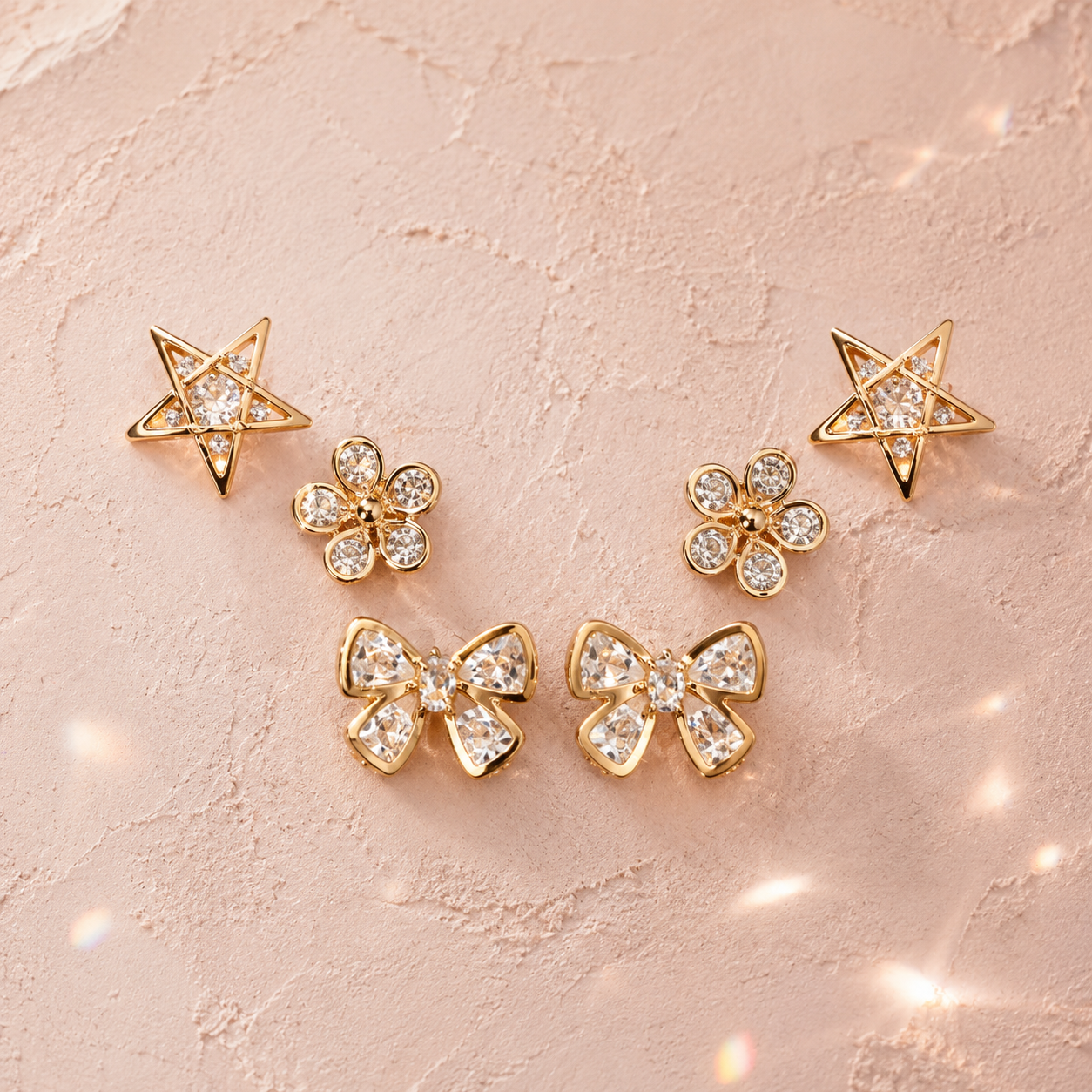 CUBIC ZIRCONIA STAR/FLOWER/BOW EARNINGS SETS