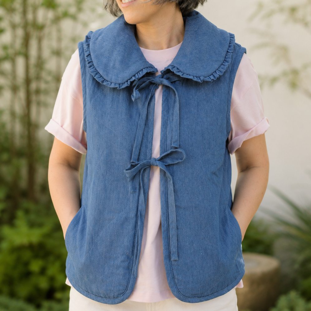 QUILTED PADDED TIE FRONT DENIM VEST