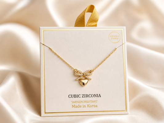 CUBIC ZIRCONIA HEART PAVED BOW