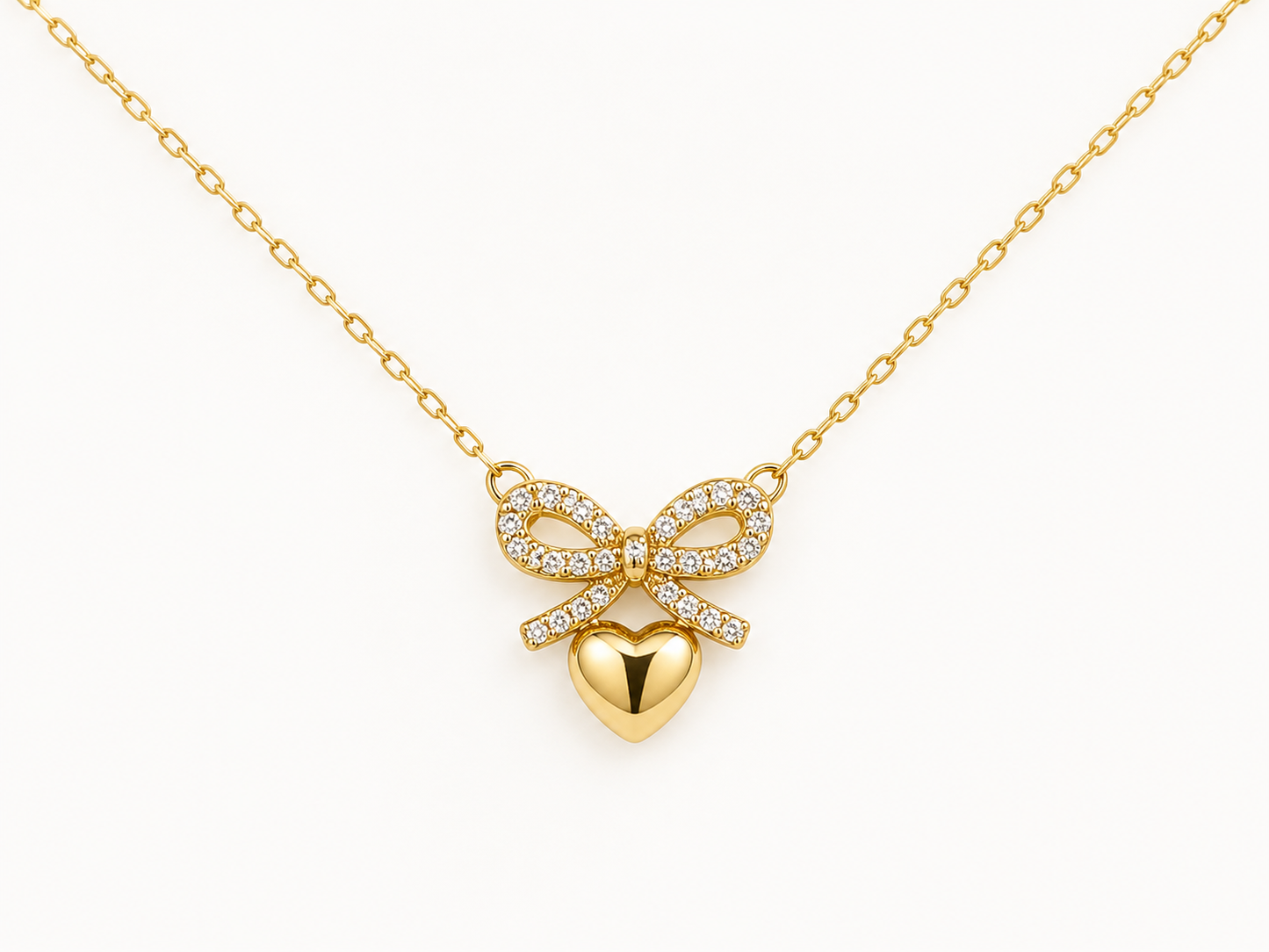 CUBIC ZIRCONIA HEART PAVED BOW