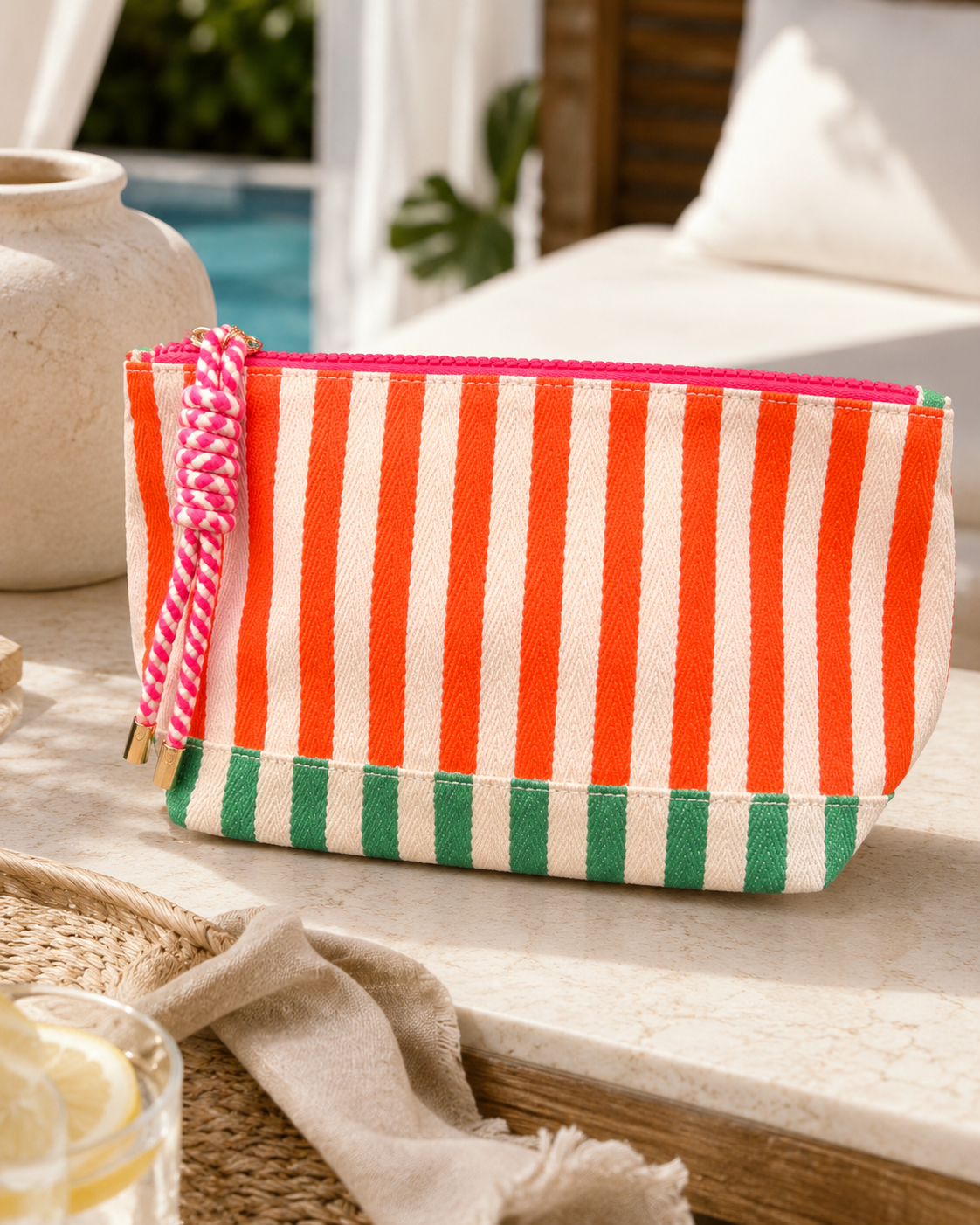 TWO TONE STRIPED TASSLE ZIP POUCH