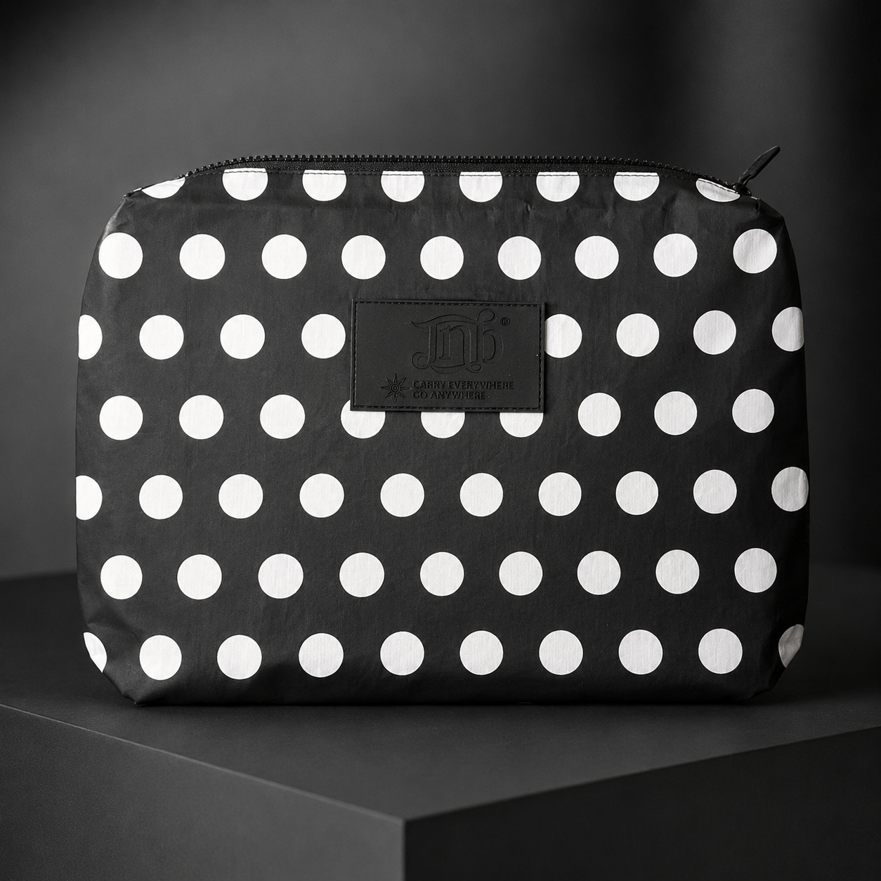 WATERPROOF OVERSIZED POLKADOT ZIP POUCH- BLK