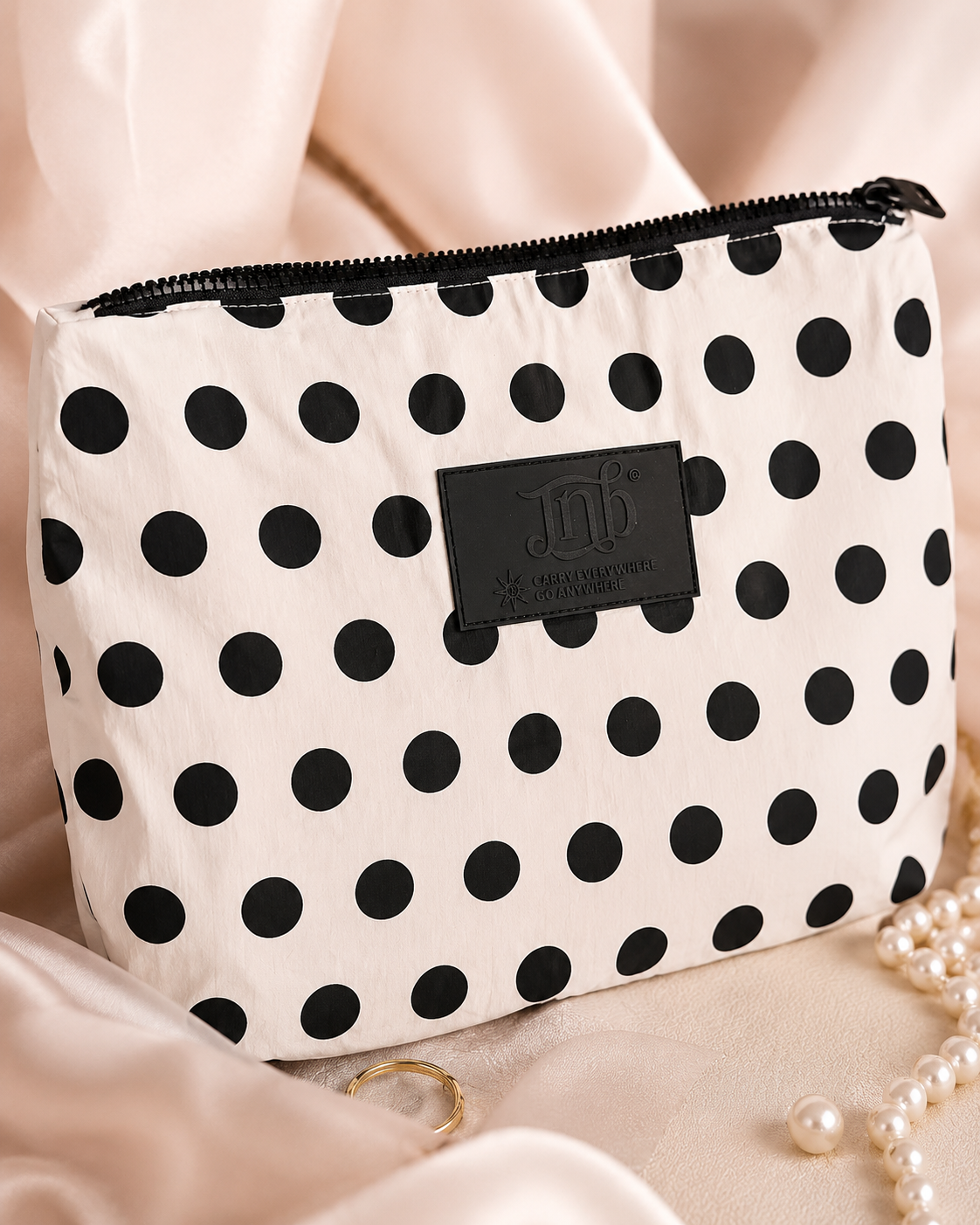 WATERPROOF OVERSIZED POLKADOT ZIP POUCH
